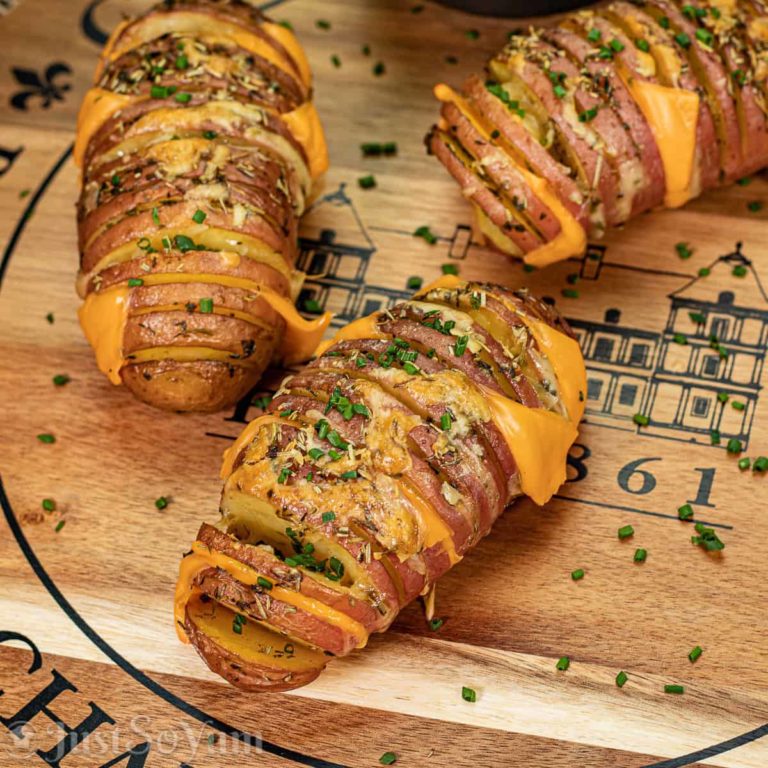Cheesy Weber Q Hasselback Potatoes with Garlic Chive Butter
